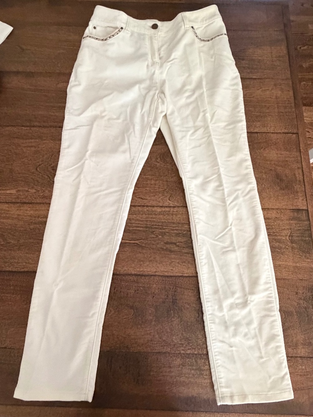 Chicos pants with rhinestone accents on the pockets.